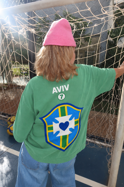 TEE BOXY 'DEUS É BRASILEIRO' - VERDE ESTONADO