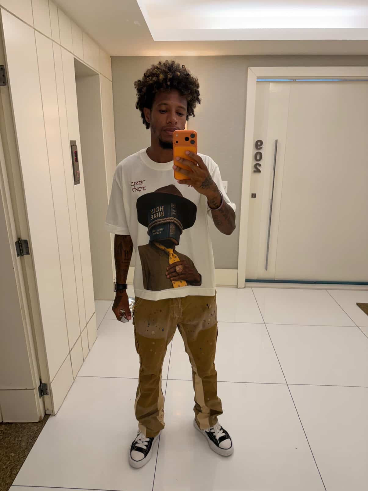 CAMISETA BOXY 'BIBLE FACE' [FRENTE]